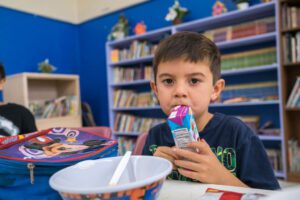 Young boy with juice box.