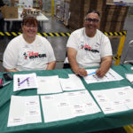 Volunteer check in at the Food Bank's studio day 2018