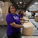 NBC Universal volunteers on production line at the Food Bank's studio day 2018