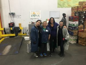 Paula Yoo volunteers at the Food Bank with friends on her 50th Birthday.