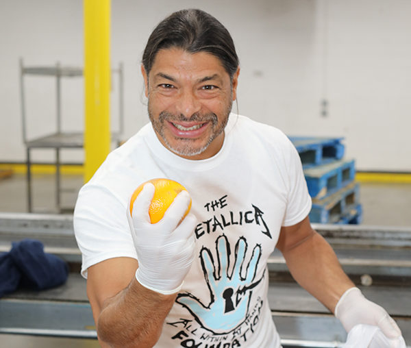 Robert Trujillo volunteers at the Los Angeles Regional Food Bank for the second time.