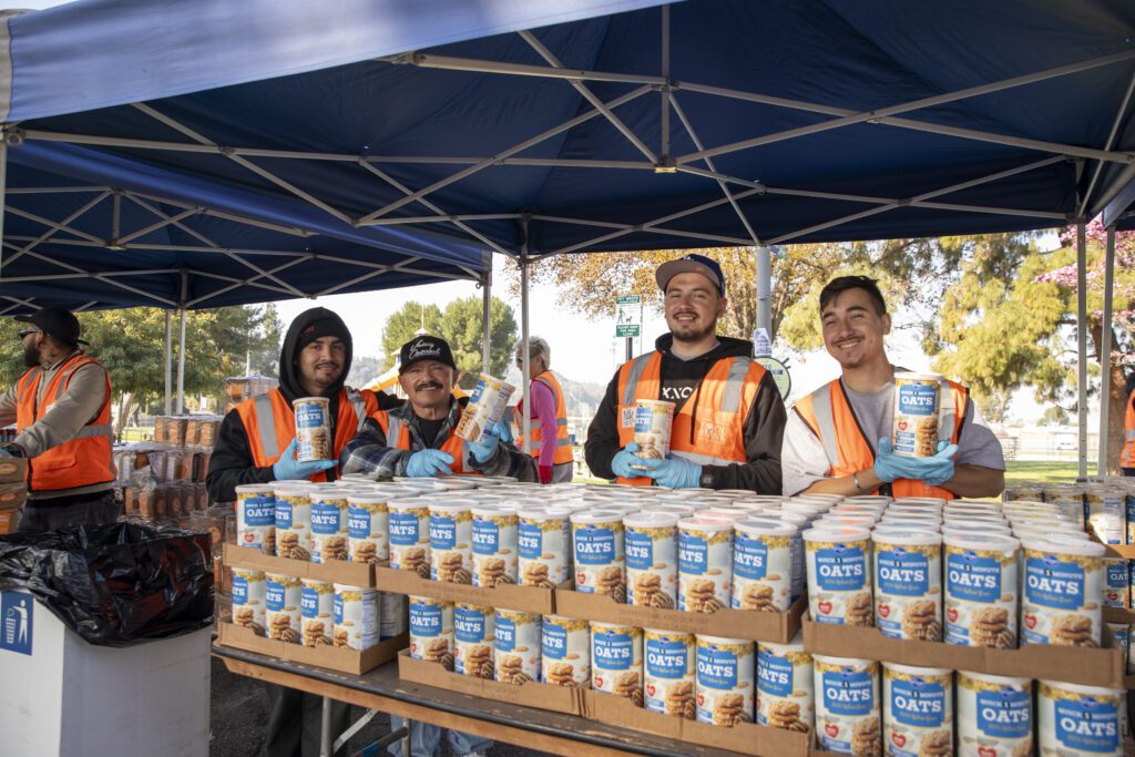 Volunteer at a food distribution at Rimgrove Park