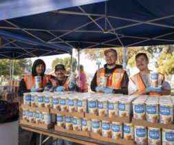 Volunteer at a food distribution at Rimgrove Park