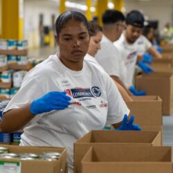 Los Angeles Clippers volunteer at the LA Regional Food Bank's distribution center at City of Industry, CA.