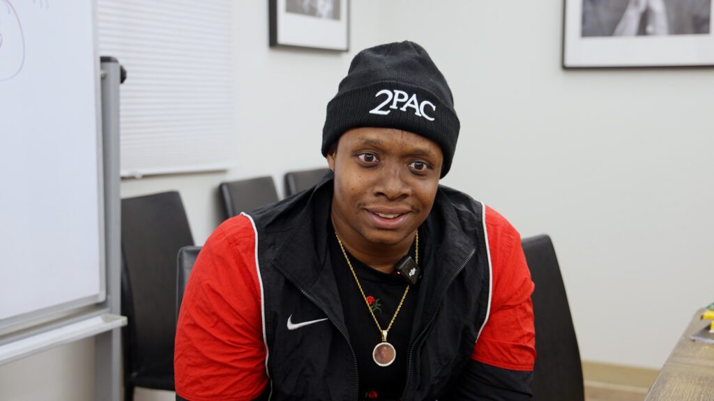 A person wearing a black 