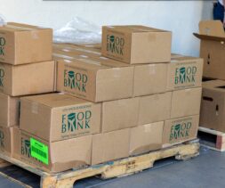 Stacks of cardboard boxes labeled 