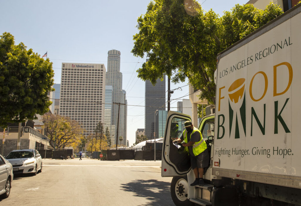 Union Bank building in the background of Food Bank truck.