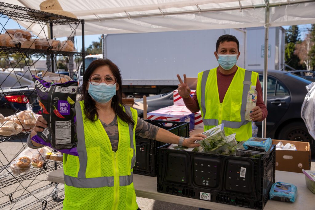 two volunteers at the Newlife Church food distribution