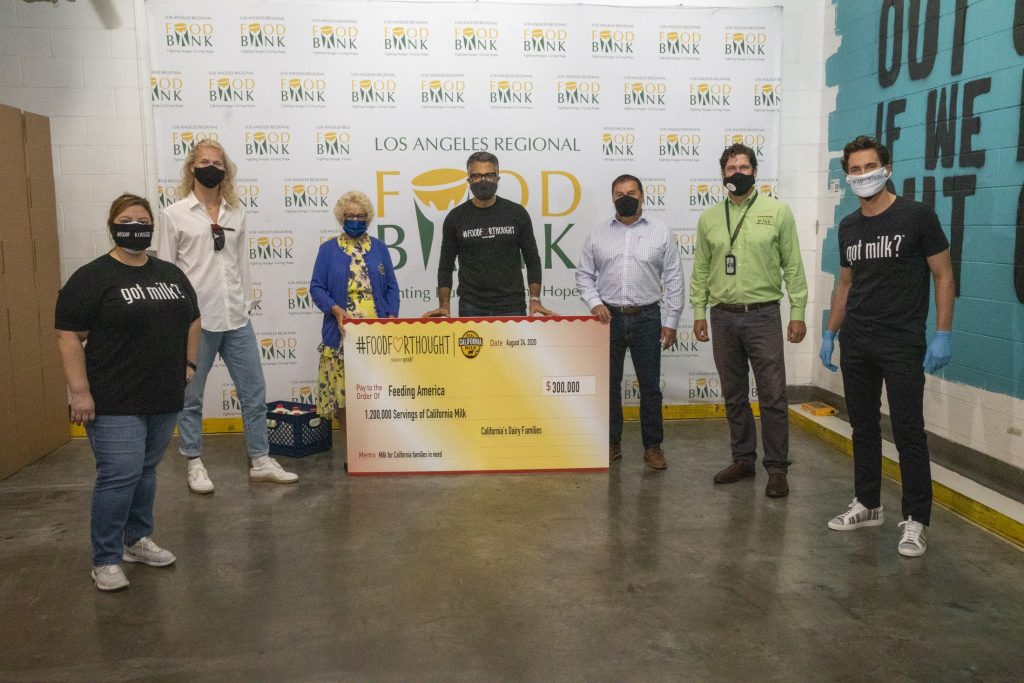 Matt Bomer and Jaime Camil at LA Regional Food Bank