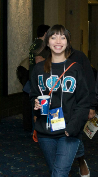 Rocking her letters at an Alpha Phi Omega event! Alpha Phi Omega (APO) is a national service organization dedicated to the principles of leadership, friendship and service! It’s through APO that Rachel truly honed in on her niche  and joy for creating community through service. A member of Alpha Phi Omega at an event.