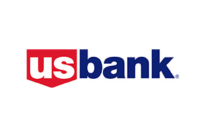 The image shows the U.S. Bank logo, featuring the letters "us" in white on a red shield background, followed by "bank" in blue lowercase. This modern design reflects their commitment to communities, supporting partners like the Los Angeles Regional Food Bank in their efforts to fight hunger.